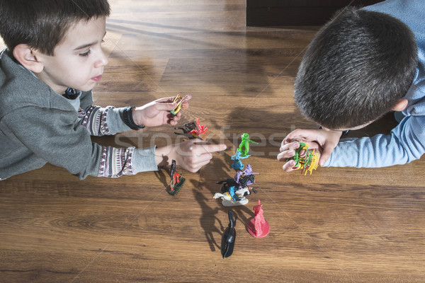 Childs playing with small toys Stock photo © deyangeorgiev