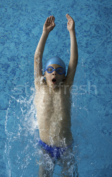 Bambino nuotatore piscina blu colore acqua Foto d'archivio © deyangeorgiev