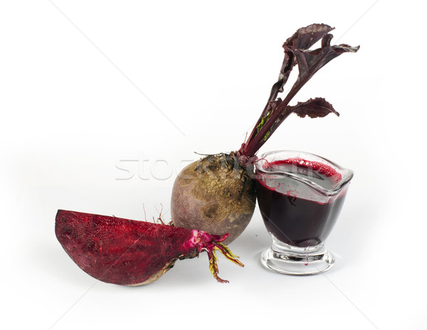 Red beets with leaves, slice beets and jug with juice Stock photo © deyangeorgiev