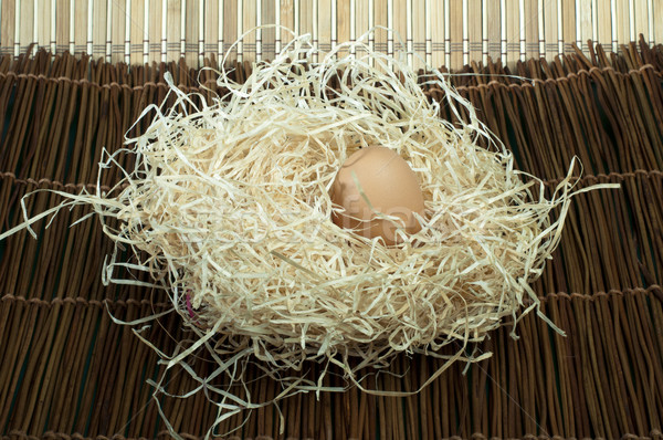 Raw eggs in straw Stock photo © deyangeorgiev