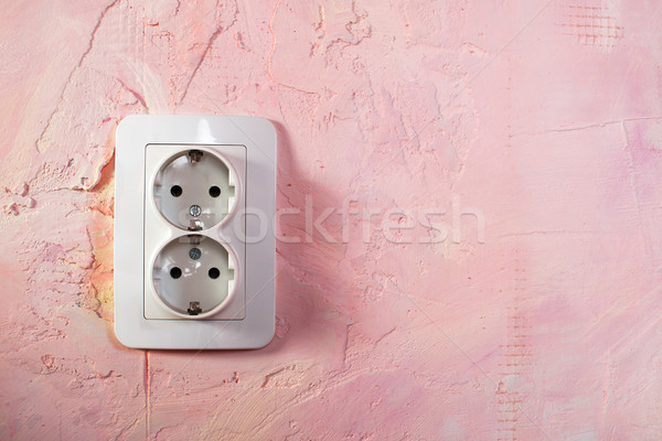 White socket on pink wall Stock photo © deyangeorgiev