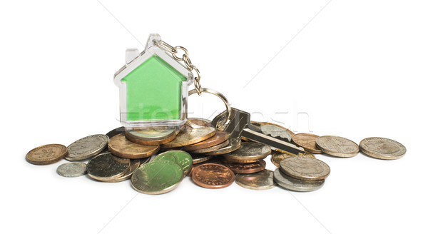 Münzen Haus Schlüsselring weiß isoliert Stock foto © deyangeorgiev