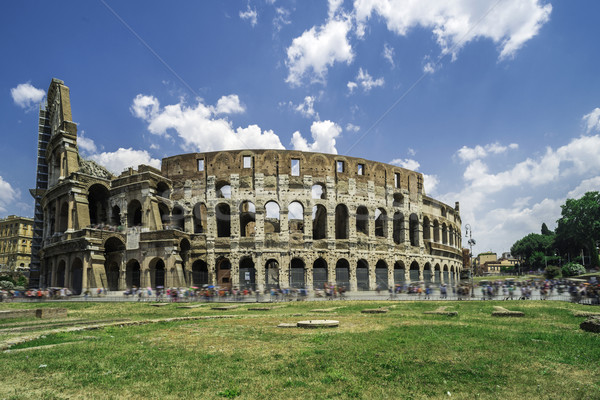 Colosseum Róma zöld fű fű kék utazás Stock fotó © deyangeorgiev