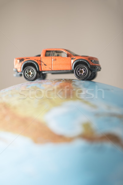 Offroad car on globe Stock photo © deyangeorgiev