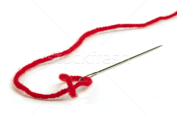 Sewing needle and red thread Stock photo © deyangeorgiev