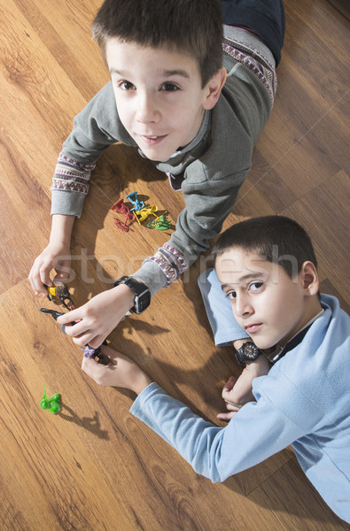 Childs playing with small toys Stock photo © deyangeorgiev
