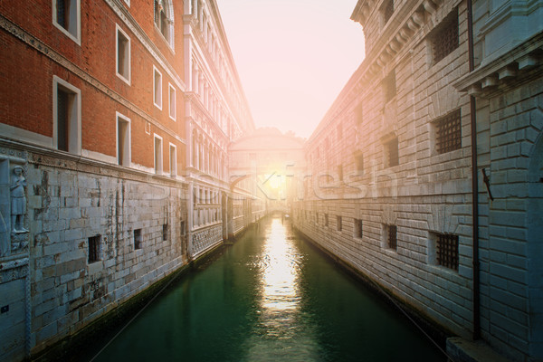 Stock photo: Ancient buildings and boats in the channel in Venice