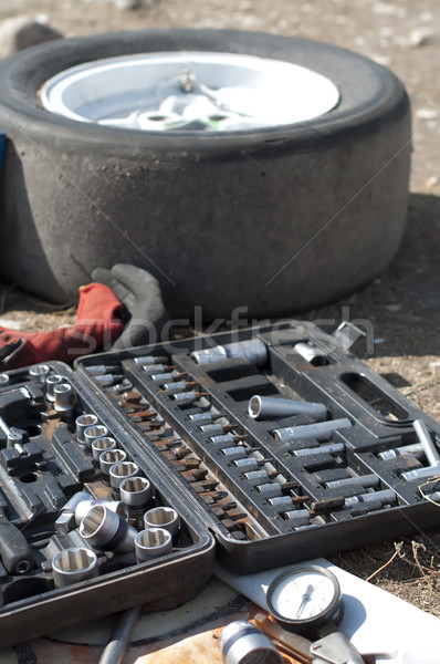 Car mechanic tools and tire Stock photo © deyangeorgiev