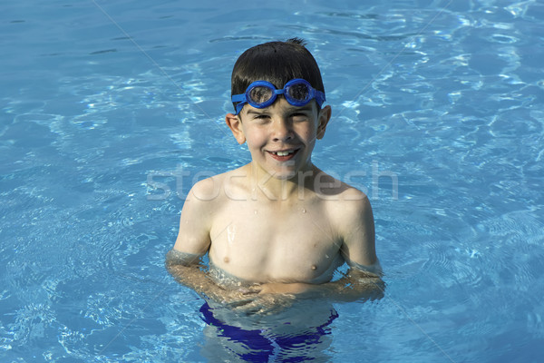 Child in swiming pool Stock photo © deyangeorgiev