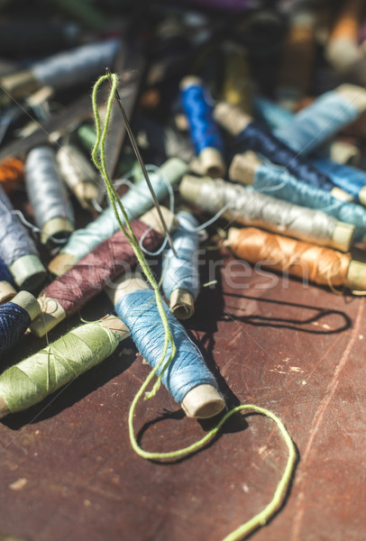 Stock photo: Sewing thread and scissors