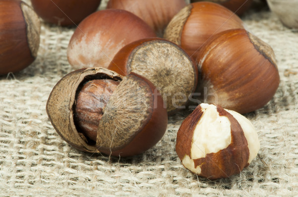 Closeup raw hazelnuts on burlap Stock photo © deyangeorgiev