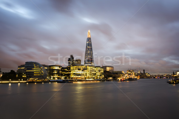 Ciudad Londres thames puesta de sol luces de la ciudad oficina Foto stock © deyangeorgiev