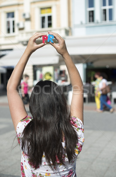 Frauen halten Holz Briefe pr Fuß Stock foto © deyangeorgiev