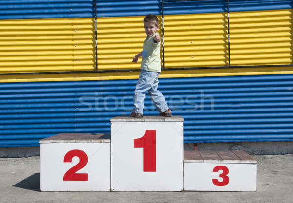 Chłopca podium mały pierwsze miejsce sportowe edukacji Zdjęcia stock © deyangeorgiev