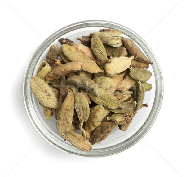 Dried cardamon in a bowl Stock photo © deyangeorgiev