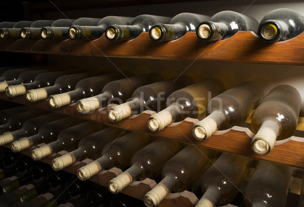 Bor üvegek polc borospince közelkép üveg Stock fotó © deyangeorgiev