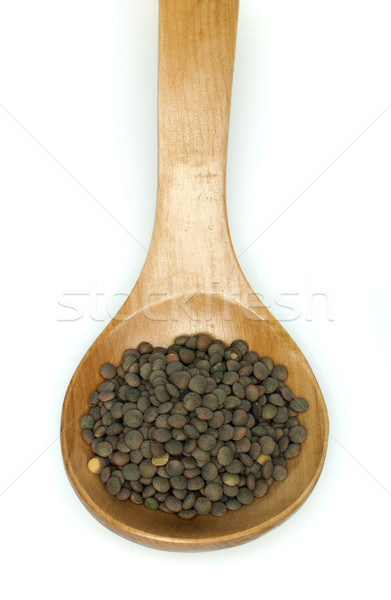 Lentil in wooden spoon Stock photo © deyangeorgiev