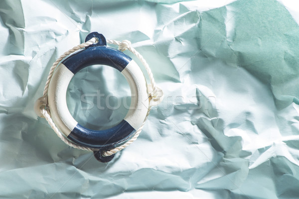 Lifebelt on blue background Stock photo © deyangeorgiev
