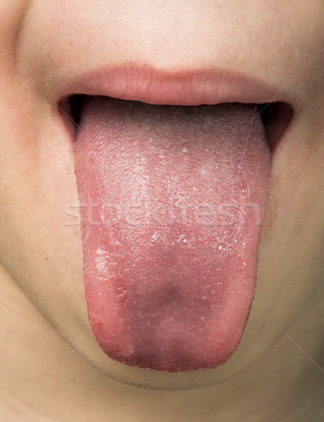 Human tongue protruding out Stock photo © deyangeorgiev