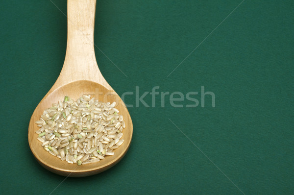 Rice integral in wooden spoon Stock photo © deyangeorgiev