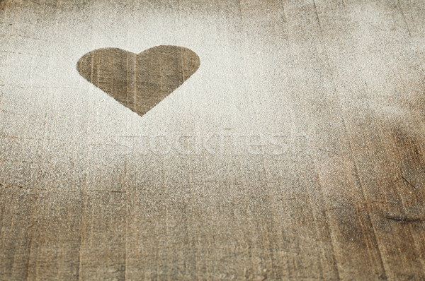 Heart pattern on an old wooden board Stock photo © deyangeorgiev