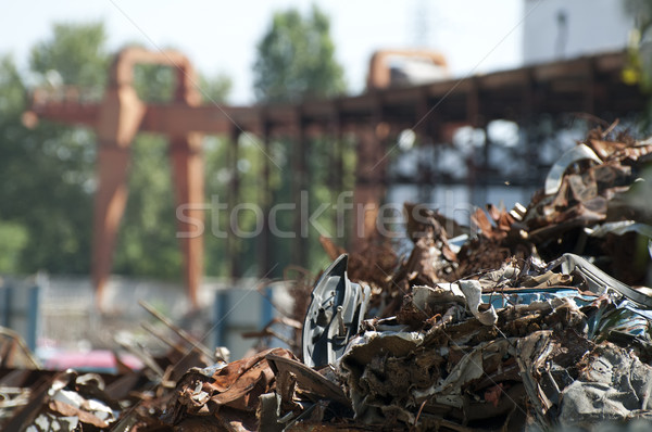 Pile of scrap iron and crane Stock photo © deyangeorgiev