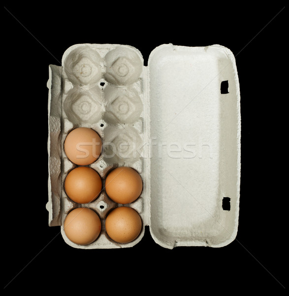 Eieren vak binnenkant geïsoleerd zwarte ei Stockfoto © deyangeorgiev