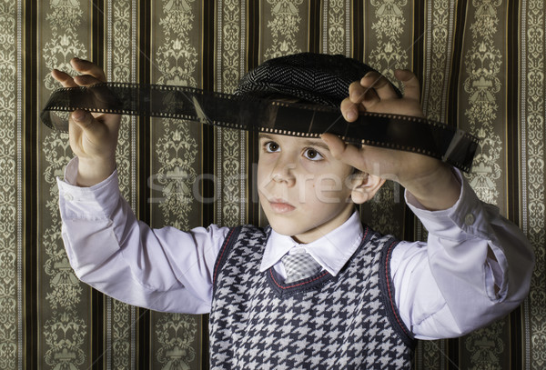 Child considered analog photographic film Stock photo © deyangeorgiev