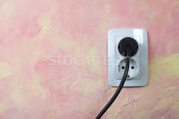 White socket and cable on pink wall.  Stock photo © deyangeorgiev