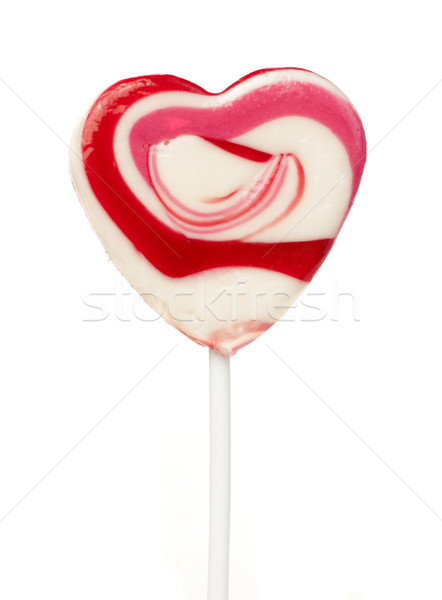 Pink lollipop heart-shaped Stock photo © deyangeorgiev