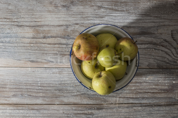 Apples in vintage metal cup Stock photo © deyangeorgiev