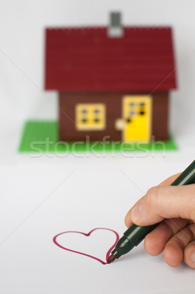 Hand write painting heart and house on background. Stock photo © deyangeorgiev