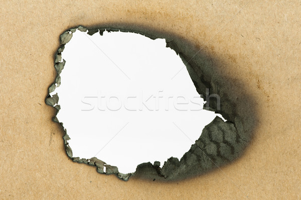 Burned paper and hole Stock photo © deyangeorgiev