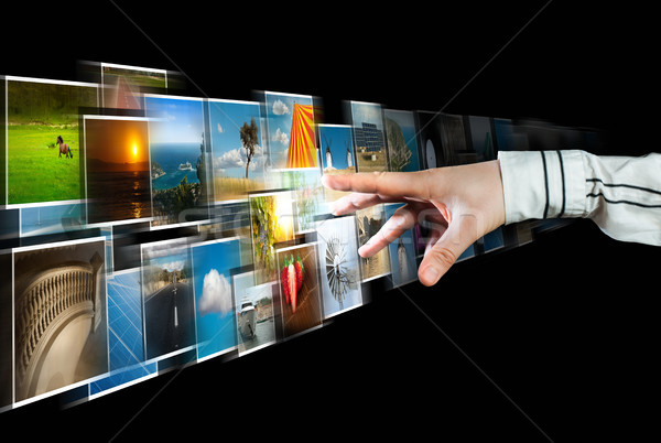 Hand reaching images streaming from the deep Stock photo © deyangeorgiev
