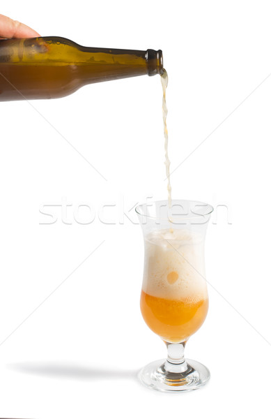 Hand holding bottle of beer and beer mug Stock photo © deyangeorgiev