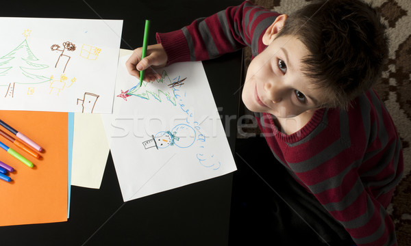 Boy drawing with markers Stock photo © deyangeorgiev
