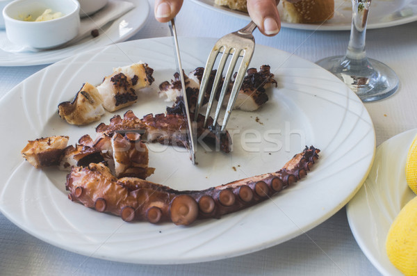 Stok fotoğraf: Ahtapot · Yunan · restoran · eller · Yunanistan