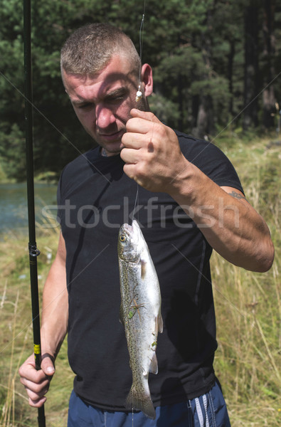 Pescatore pesce montagna uomo felice natura Foto d'archivio © deyangeorgiev