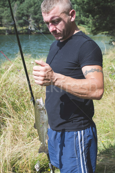 Pescatore pesce montagna uomo felice natura Foto d'archivio © deyangeorgiev