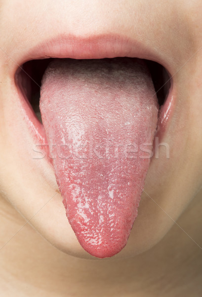 Human tongue protruding out Stock photo © deyangeorgiev