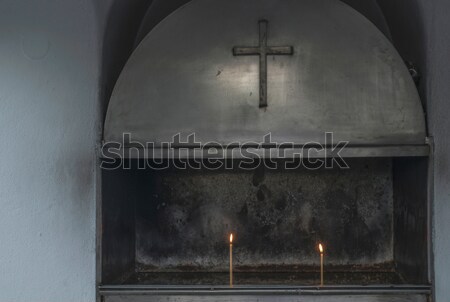 Stock photo: Burning candles in a church