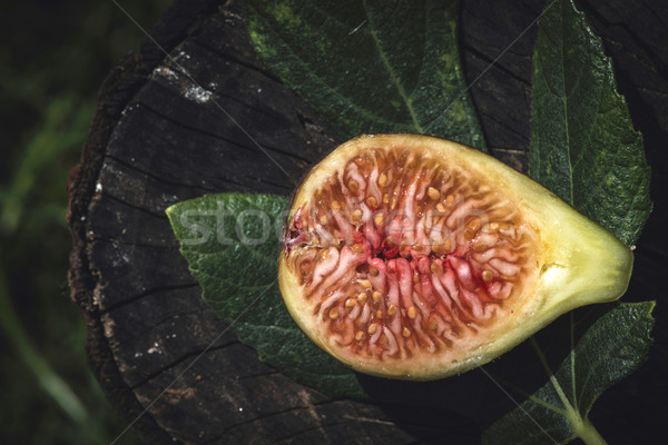 Figs and leaves on wood Stock photo © deyangeorgiev