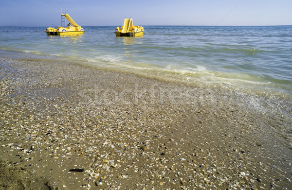 Yellow lifeboat on the beach. Stock photo © deyangeorgiev