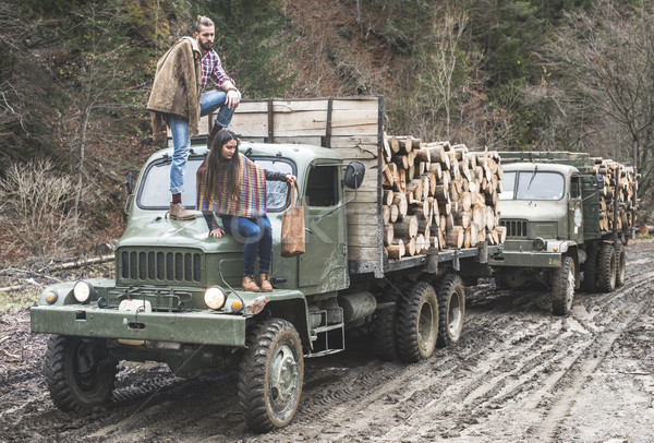 Young man and girl on truck Stock photo © deyangeorgiev