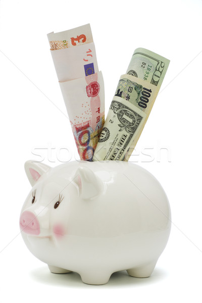 Piggy bank and major world currencies Stock photo © dezign56