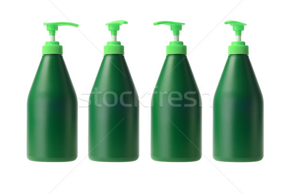 Négy műanyag üvegek zöld csetepaté fehér Stock fotó © dezign56