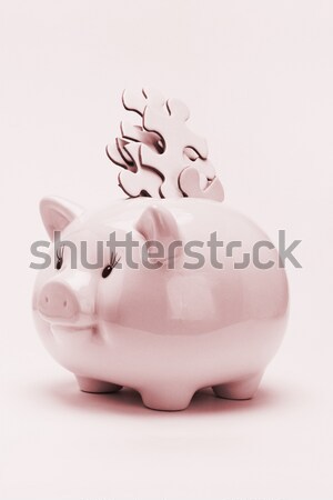Stock photo: Piggy bank and jigsaw puzzles financial disarray