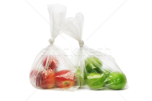 Red and green apples in plastic bags Stock photo © dezign56