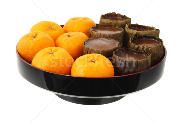 Mandarin Oranges and Rice Cakes Stock photo © dezign56