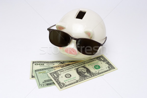 Blind piggy bank and US dollars Stock photo © dezign56